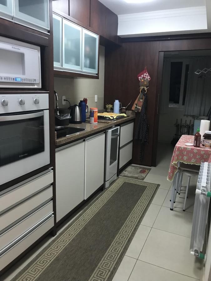 Lindo apartamento no centro de Canela Esterno foto